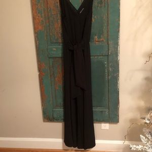 Boutique black jumpsuits with tie at the waist.